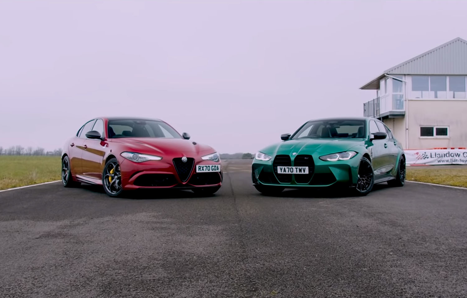 BMW M3 Competition vs Alfa Romeo Giulia Quadrifoglio handling comparison in dynamic driving footage