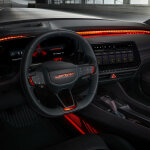 A new steering wheel design for the Dodge Charger Daytona SRT Concept offers a thinner feel, with a flat top and bottom, and an illuminated red SRT logo lights up the steering wheel center.