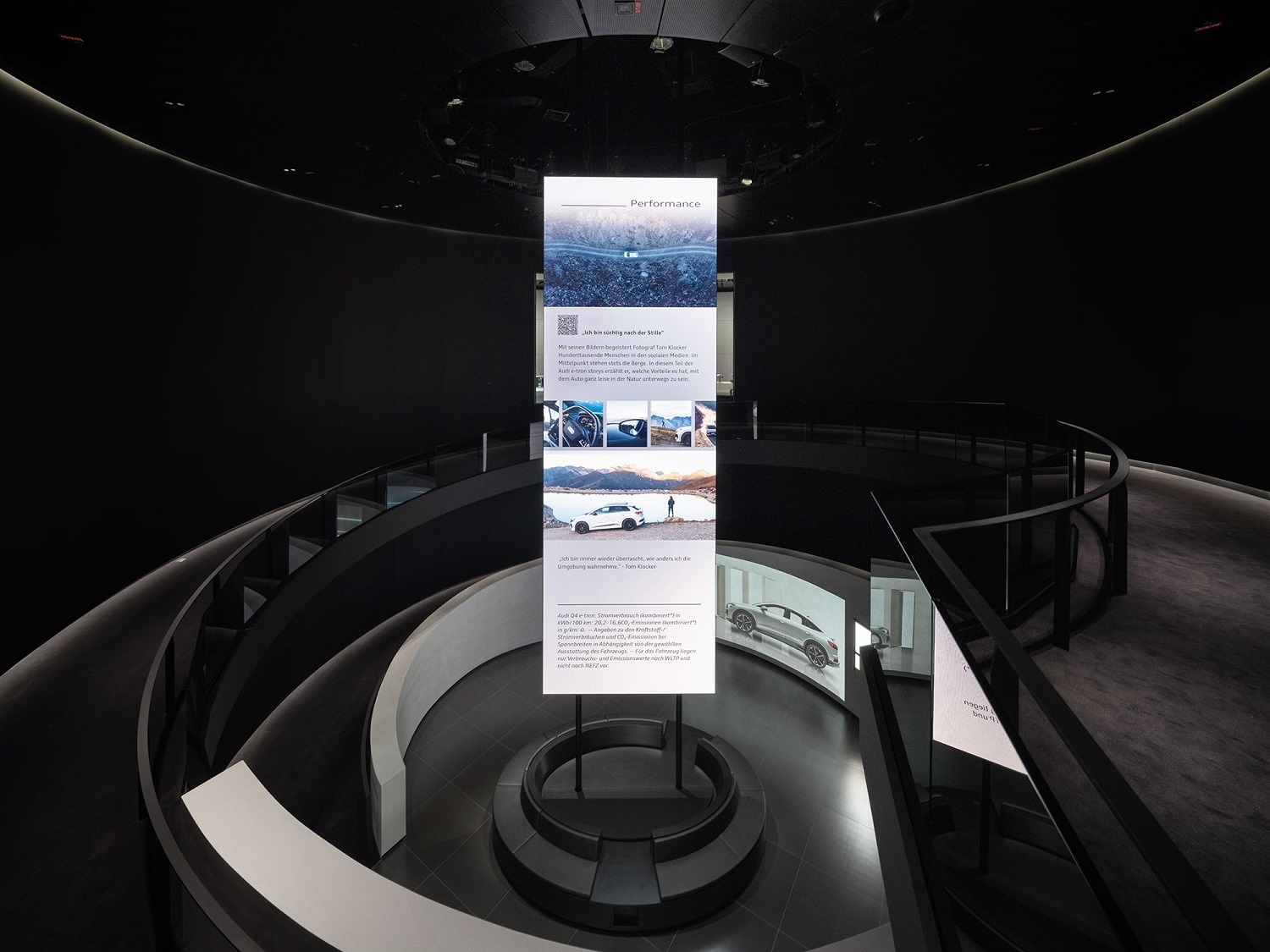 The centerpiece of the pavilion is the "Blog of Progress" in the open rotunda, which spatially connects both exhibition levels on the upper floor with the entrance level.
