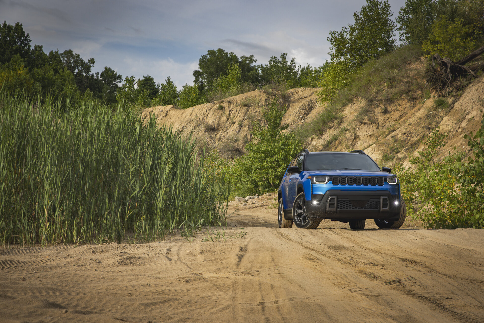 A front view of the 2026 Jeep® Cherokee Overland, parked A front view of the 2026 Jeep® Cherokee Overland, parked