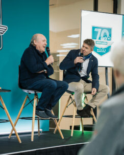 Designer Ian Callum addresses guests at the Aston Martin Works 70th anniversary event