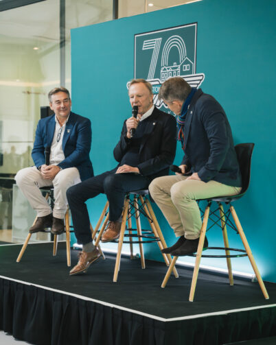 Motorsport legend and Nimrod racer Ray Mallock (centre) at the Aston Martin Works 70th anniversary event