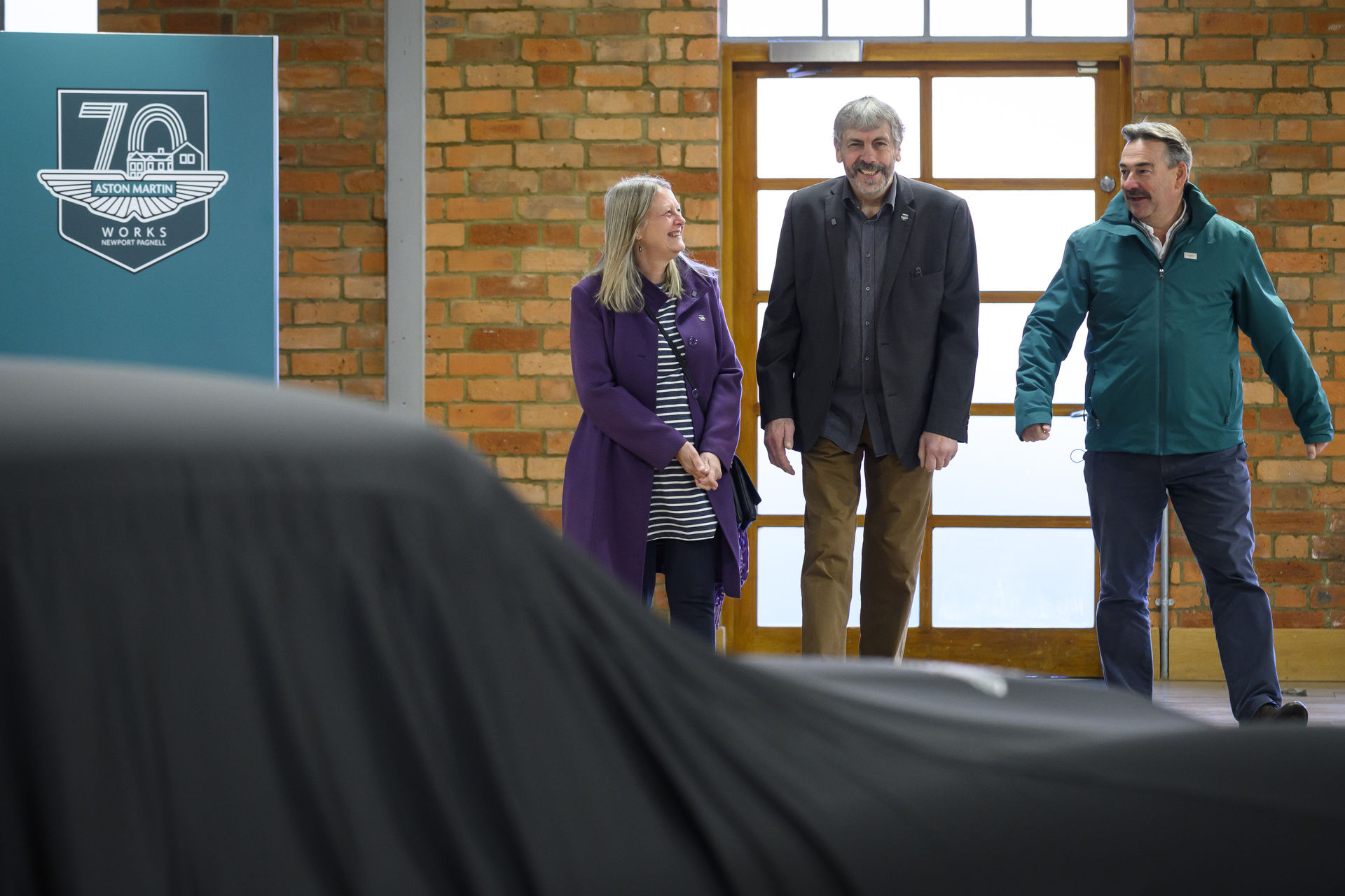 Mr and Mrs Williams with Paul Spires, President of Aston Martin Works, at the unveiling of their restored DB5 Vantage Mr and Mrs Williams with Paul Spires, President of Aston Martin Works, at the unveiling of their restored DB5 Vantage