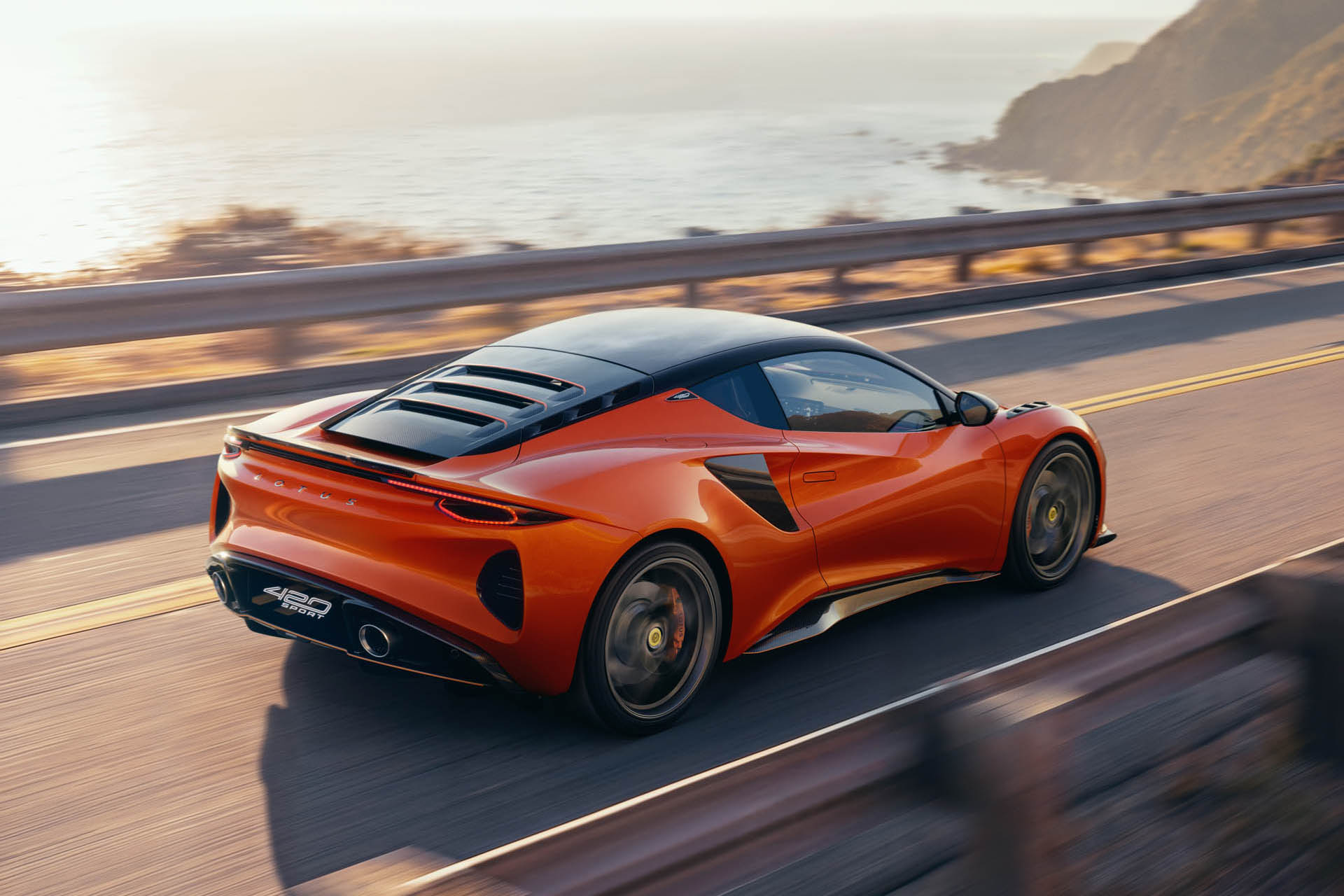 Lotus Emira 420 Sport Rear Driving Lotus Emira 420 Sport Rear Driving