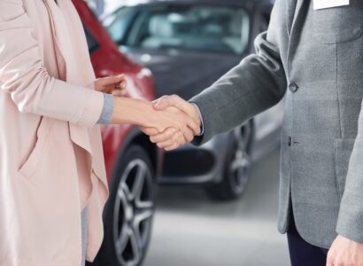envato close up of handshake salesman and woman 2026 01 06 08 52 00 utc
