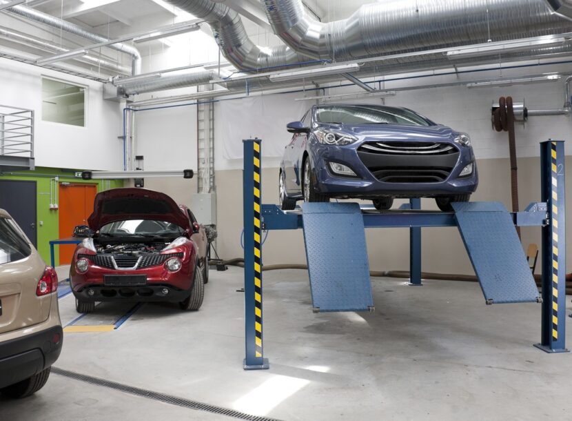 cars in a large repair workshop or garage 2026 01 09 09 06 19 utc