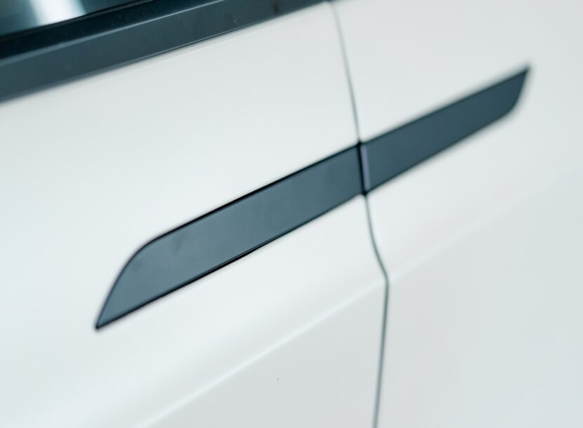 envato modern white car door handle detail close up 2026 03 17 21 45 28 utc
