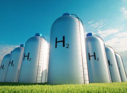 hydrogen tanks on green grass under blue sky 2026 03 09 23 08 51 utc