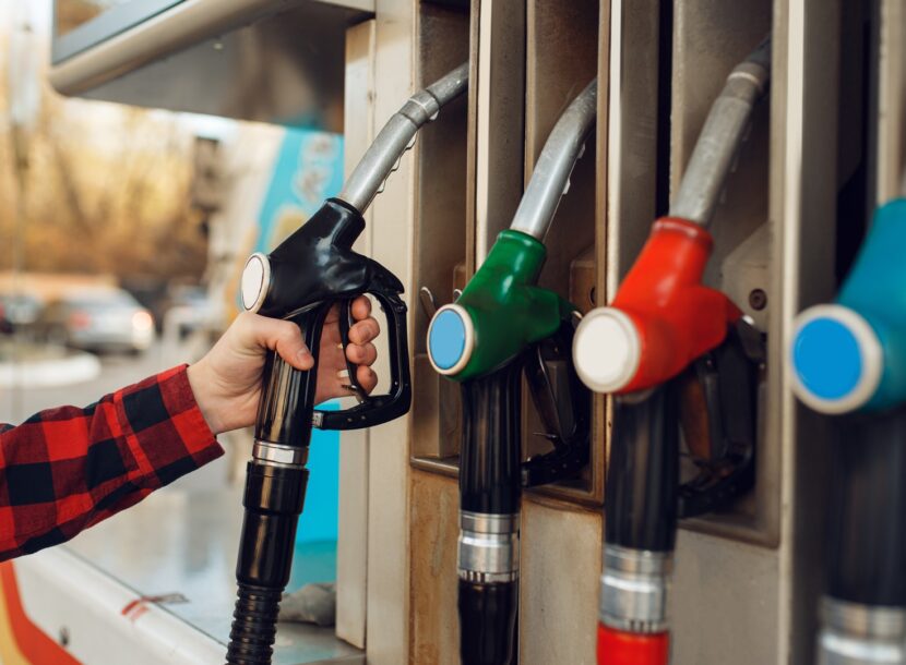 hand holding gas pump nozzle at gas station 2026 03 16 01 13 46 utc